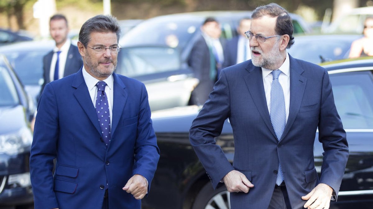 Mariano Rajoy, amb el ministre de Justícia, Rafael Catalá.