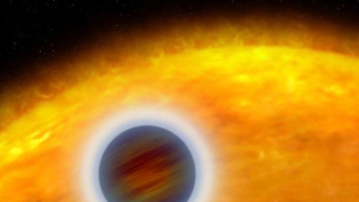 Il·lustració artística d'un exoplaneta que orbita molt a prop de la seva estrella.