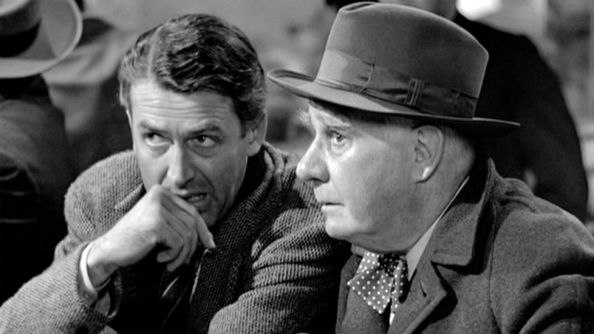 George Bailey con el ángel Clarence.