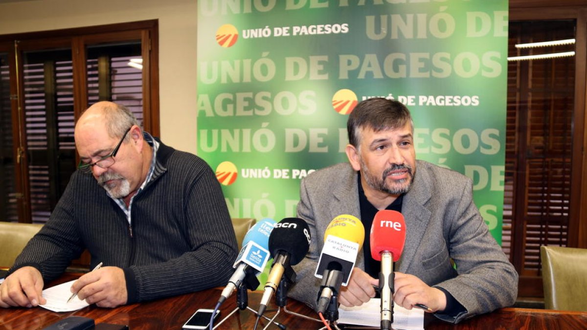 El coordinador de UP en Lleida, Jaume Pedrós, junto al coordinador nacional, Joan Caball.