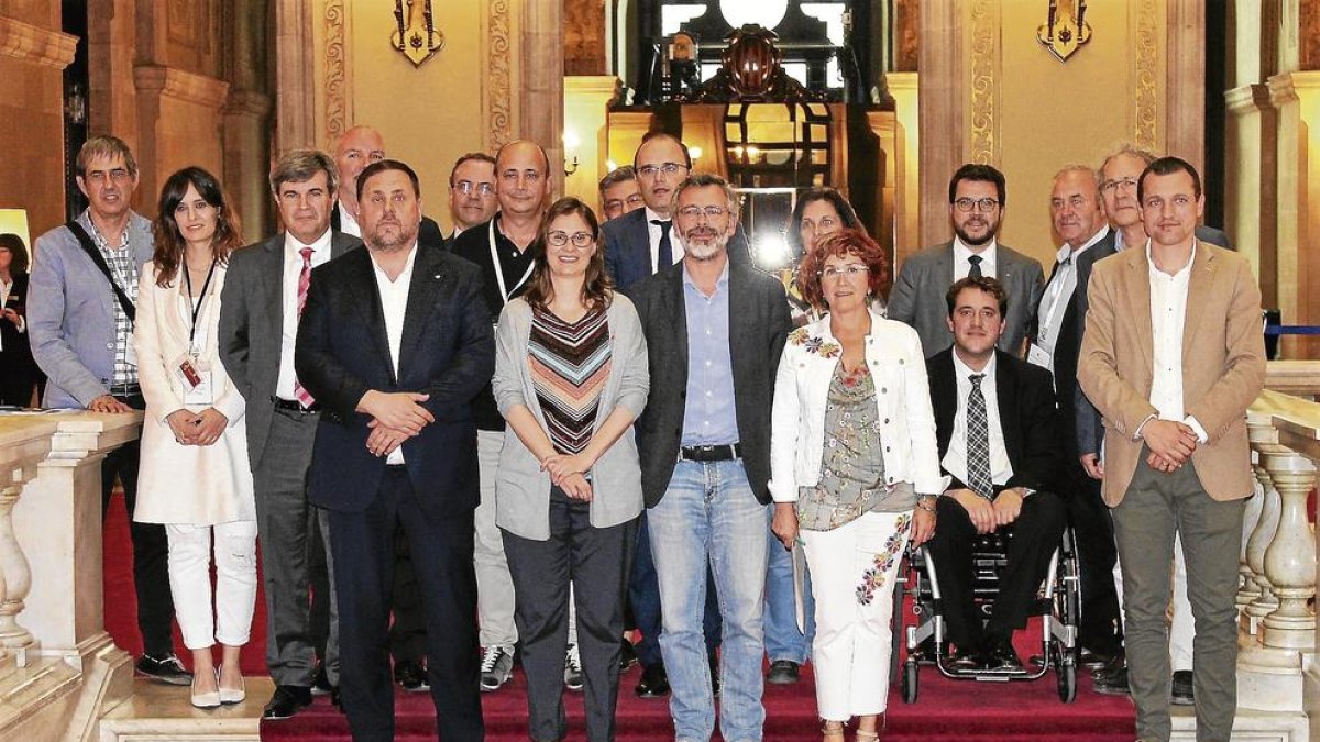 Miembros del Govern y de la ponencia que ha elaborado la ley.