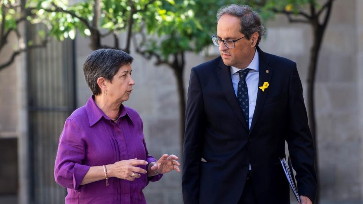 El president de la Generalitat, Quim Torra, i la delegada del