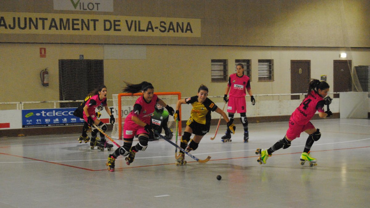 Una acción del partido entre el Vila-sana y el Palau de Plegamans disputado ayer