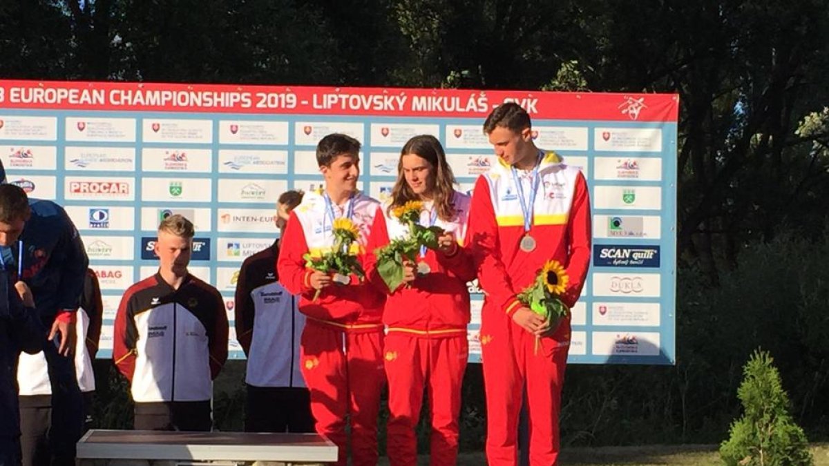 Àlex Goñi, Pau Etxaniz y Adrià Moyano, en el tercer cajón del podio.