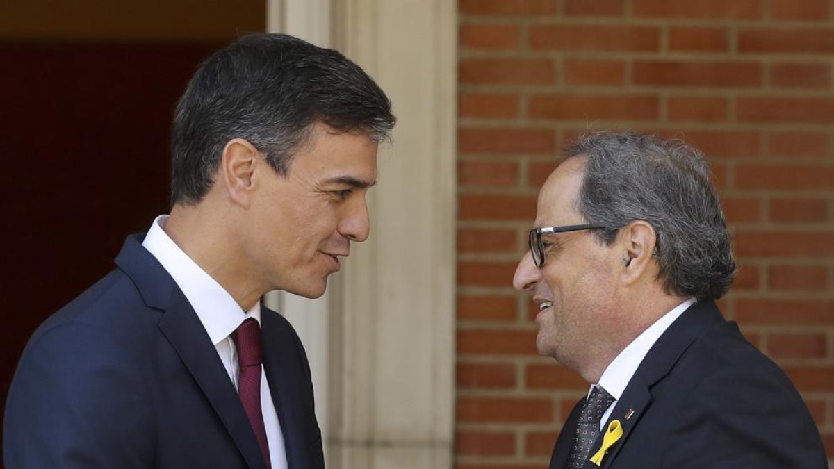 Sánchez i Torra durant la reunió que van mantenir al juliol.