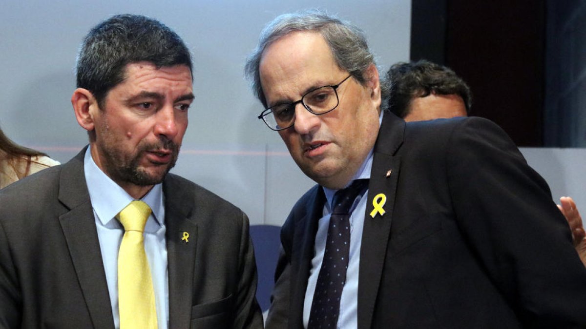 El president de la Generalita, Quim Torra, junto al presidente de la Cambra de Barcelona, Joan Candell.