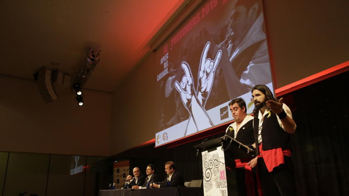 Ferran Aixalà i Jordi Huete, de Pastorets Rock, durant el seu pregó d’ahir a la Llotja.