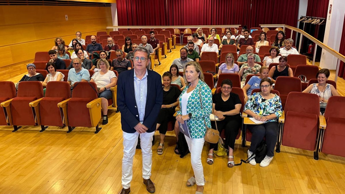 Talarn y la secretaria general de la ACM, Joana Ortega, en la jornada. 