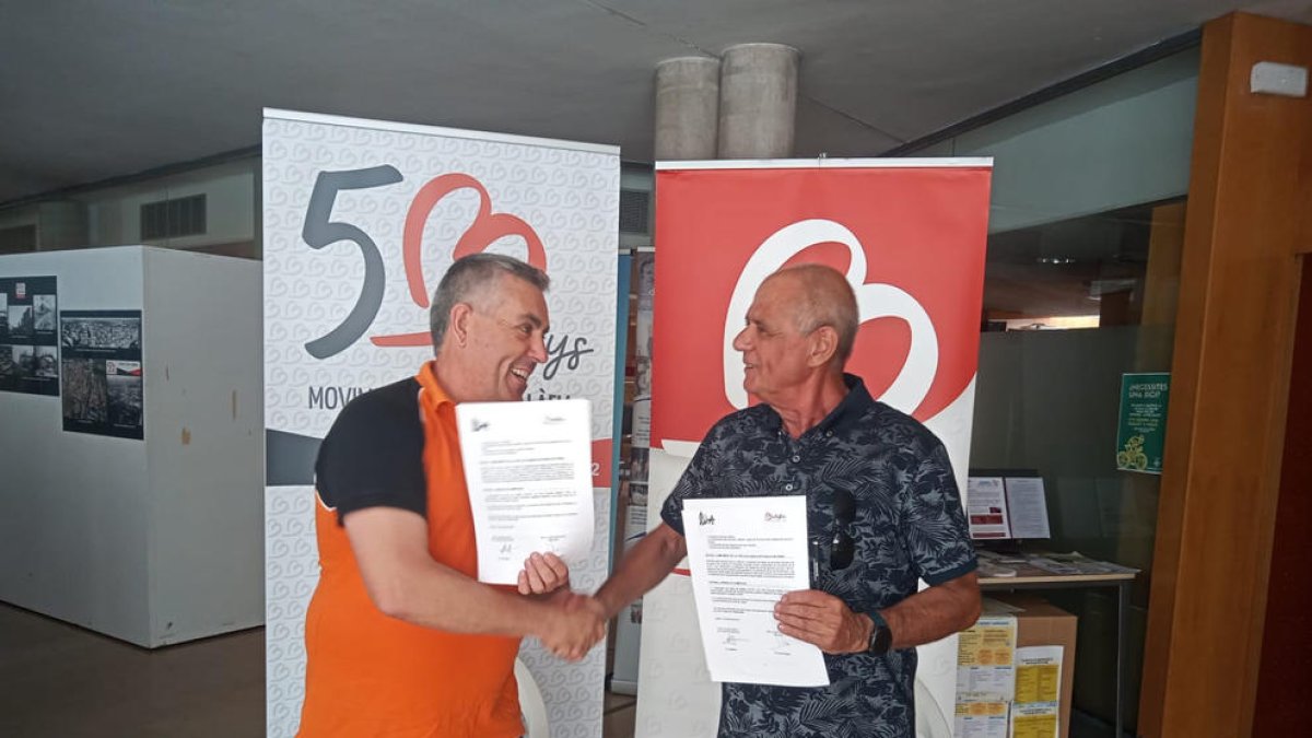 Jordi Borràs y Toni Baró, tras la firma del convenio.