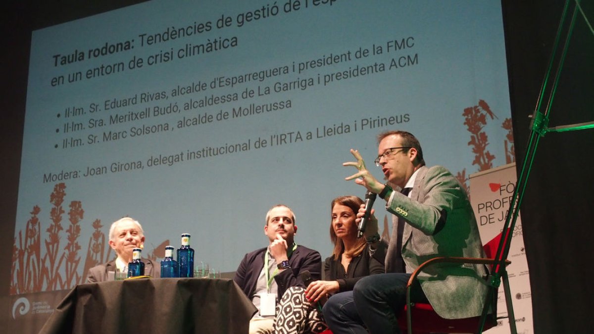 Un moment de la taula redona amb Joan Girona, Eduard Rivas, Meritxell Budó i Marc Solsona.