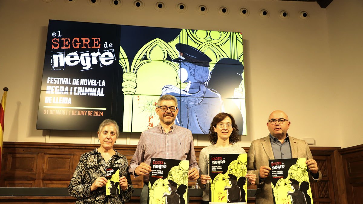 Vàzquez, amb Antònia Capdevila, de la Biblioteca de Lleida, i Pagès, amb Estanislau Fons, de la UdL.