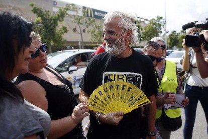 Benavent ahir quan arribava a la Ciutat de la Justícia.