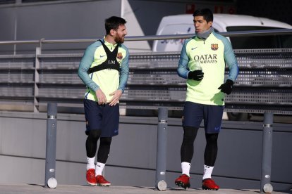 Leo Messi i Luis Suárez durant l’entrenament que va fer ahir la plantilla blaugrana.