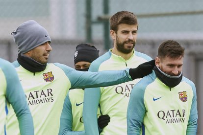 Luis Suárez, Neymar, Piqué y Messi durante el entrenamiento de ayer en la Ciutat Esportiva.