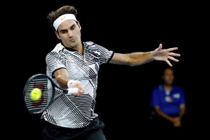 Roger Federer, durant el partit davant del també suís Wawrinka.