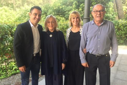 Xavi Hernández y sus padres