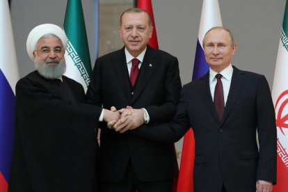 Imatge dels líders iranià, turc i rus.