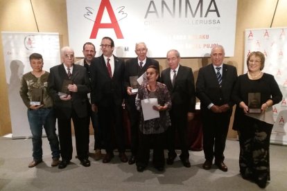 Foto de grupo de los homenajeados, ayer en la gala celebrada en el restaurante Resquitx de Golmés.