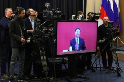 Videoconferencia en la que aparece el lider chino Xi Jimping.