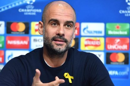 Guardiola amb el seu etern llaç groc.