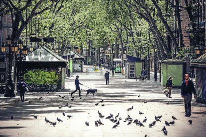 Carrers buits arreu del món pel virus. A la foto, la Rambla.