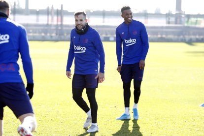 Jordi Alba y Nelson Semedo durante el entrenamiento.