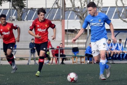 Una acción del partido de ayer entre Lleida y Mallorca.