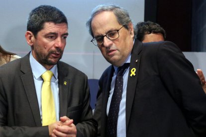 El president de la Generalita, Quim Torra, junto al presidente de la Cambra de Barcelona, Joan Candell.