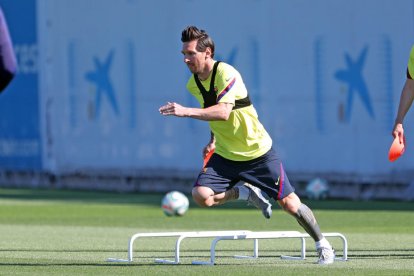 Leo Messi, durant l’entrenament del Barcelona, ahir a la Ciutat Esportiva.