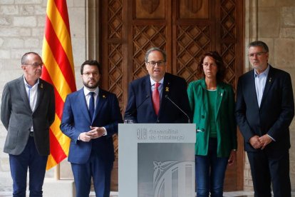 El alcalde de Lleida, Miquel Pueyo, escucha las manifestaciones del President Quim Torra.