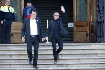 Lluís Salvadó y Josep Maria Jové saliendo del TSJC el 11 de marzo tras acudir a declarar.