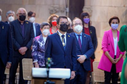 El president Aragonès y, de fondo, el ministro Iceta y la delegada Teresa Cunillera, ayer, en Barcelona.