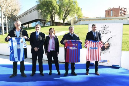 Espanyol, Barcelona i Girona, ahir durant la presentació de la col·laboració amb La Marató.