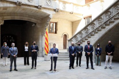 Presentación del plan de ayudas a empresas y trabajadores en ERTE, ayer en Barcelona.