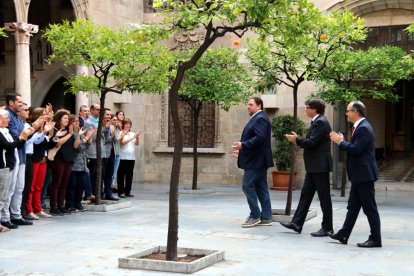 Junqueras, Puigdemont i Turull, aplaudits ahir.