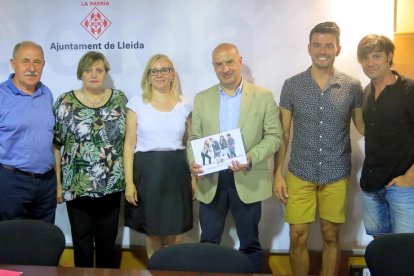 Los organizadores durante la presentación en la Paeria.