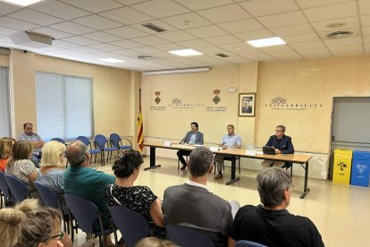 Gavín, Setó y Talarn, ayer en el acto de presentación del acuerdo en la sede del consell de Les Garrigues.