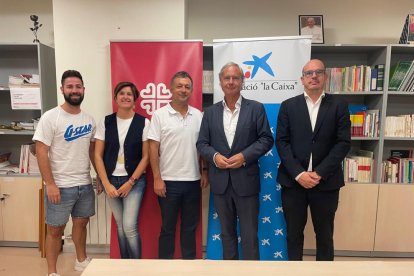 Representants de Càritas Lleida i la Fundació La Caixa.