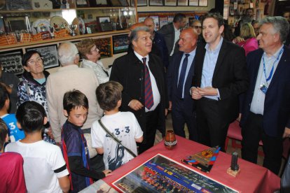 Laporta, al costat del directiu del Barça Josep Ignasi Macià i el president de la penya, Miquel Pascual.