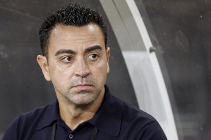 Xavi Hernández, serio durante el partido ante el Arsenal.