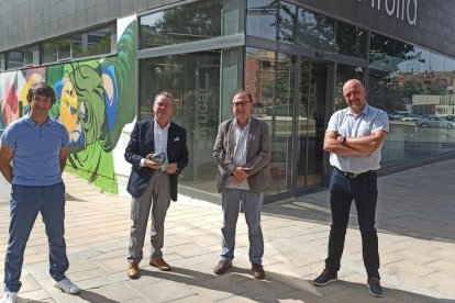 Manel Simón, Joan Serentill, Carmel Mòdol i Francesc Torres, abans de donar compte de les previsions.