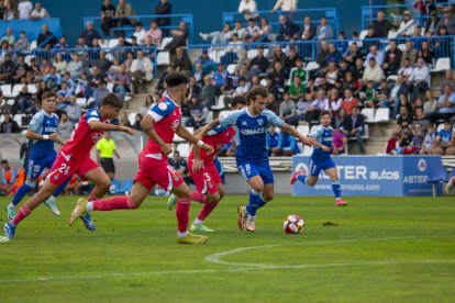 Juan Agüero és perseguit per diversos jugadors de l’Espanyol.