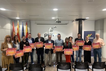 Llaràs, Salvador i Solsona, amb representants dels comerciants.