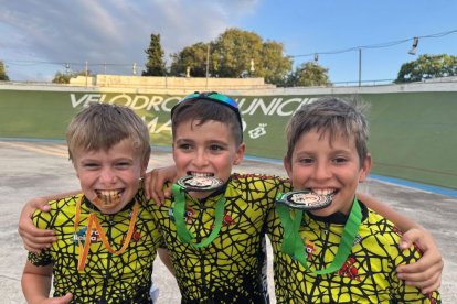 Pau Roca, Quim Fanlo i Quim Florensa, amb les medalles.