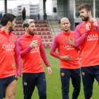 Suárez, Messi, Neymar i Piqué, durant l’entrenament d’ahir del Barcelona.