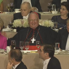 Clinton i Trump, al costat de l’arquebisbe de Nova York.