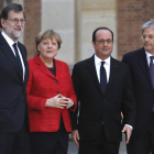 Rajoy, Merkel, Hollande y Gentiloni, ayer en Versalles.