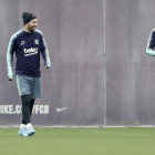 Messi i el xilè Arturo Vidal ahir durant l’entrenament matinal de la plantilla blaugrana.