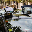 Los 1.500 taxis que ocupan la Gran Via cortan el tráfico en Paseo de Gracia