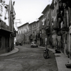 Una imatge dels anys 60 del carrer Saragossa de Mequinensa, que va ‘desaparèixer’ sota el pantà.